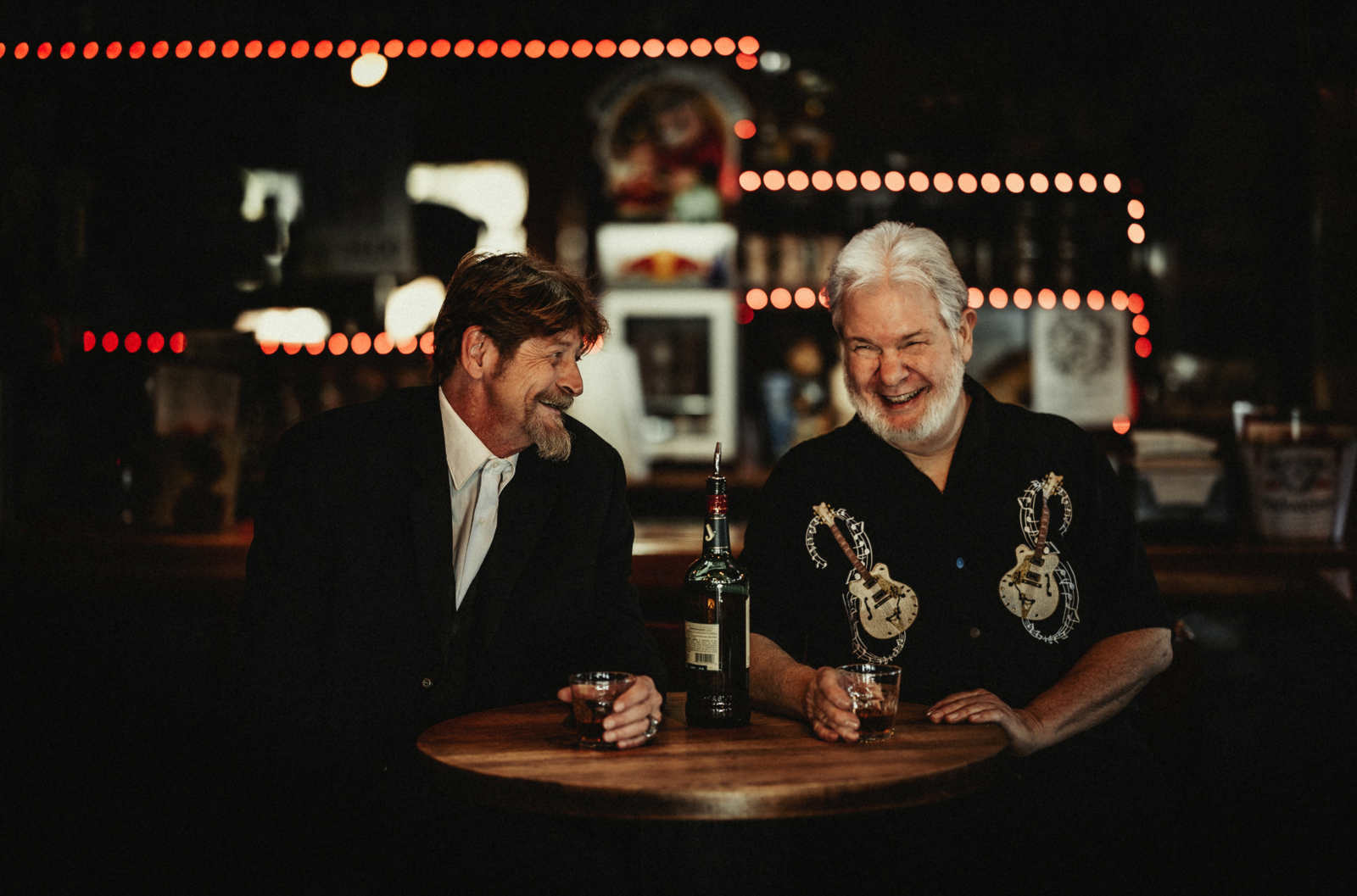 Drum & Dye drinking and laughing