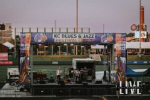 Kansas City Blues and Jazz Festival 2025, broad view of stage in a baseball field. Photo credit Black Moon Media LIVE