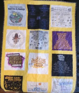 quilt made of vintage KC Blues Society tee shirts