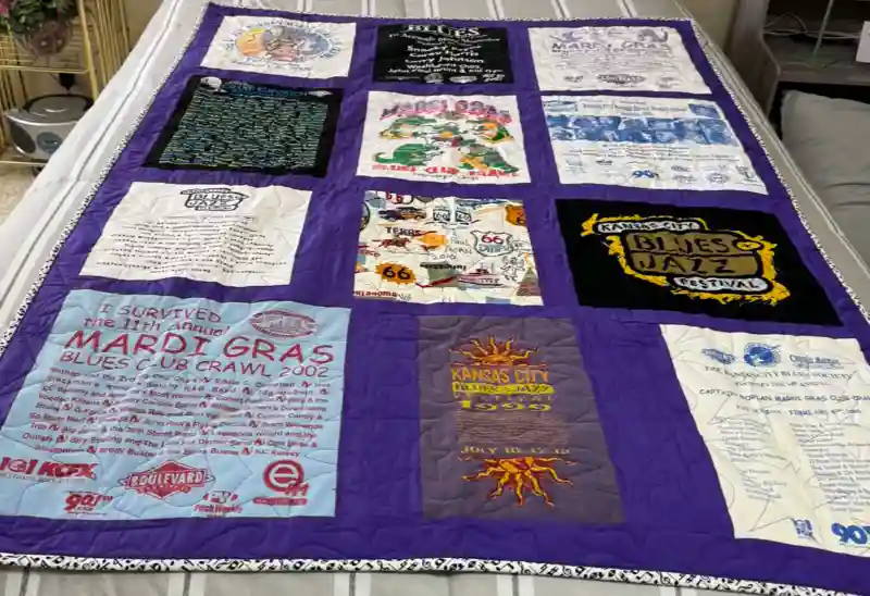 quilt made of vintage KC Blues Society tee shirts
